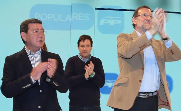 Rico con Rajoy en una visita a Burgos