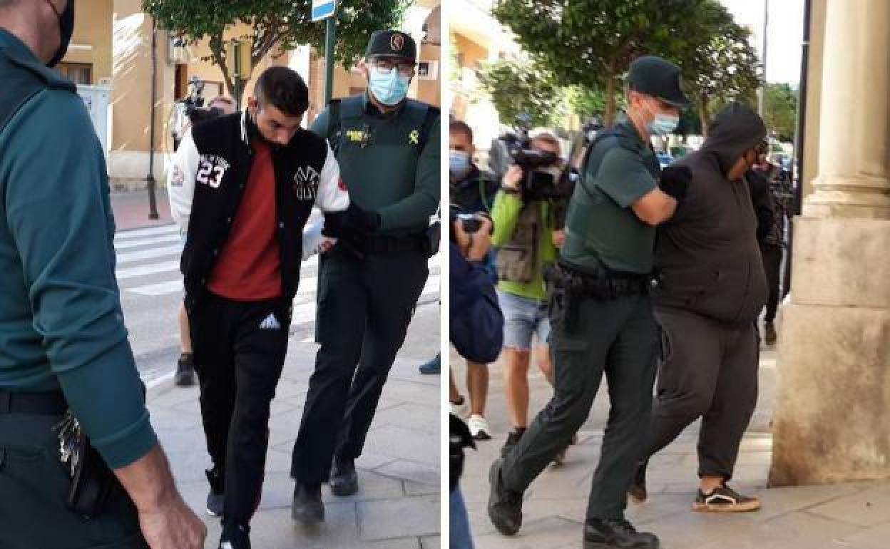 Dos de los detenidos por la agresión sexual a una menor entrando en los Juzgados de Valencia.