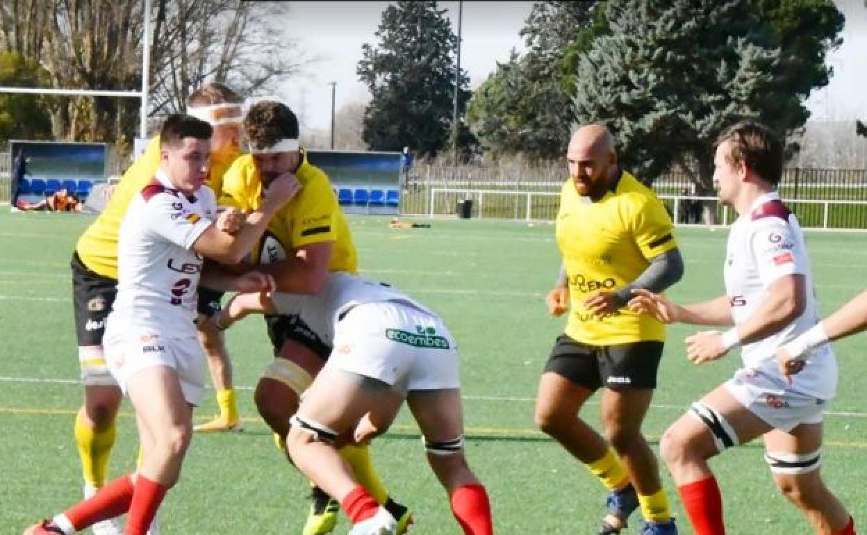 Wagenaar con el oval, junto a Wozniak. 