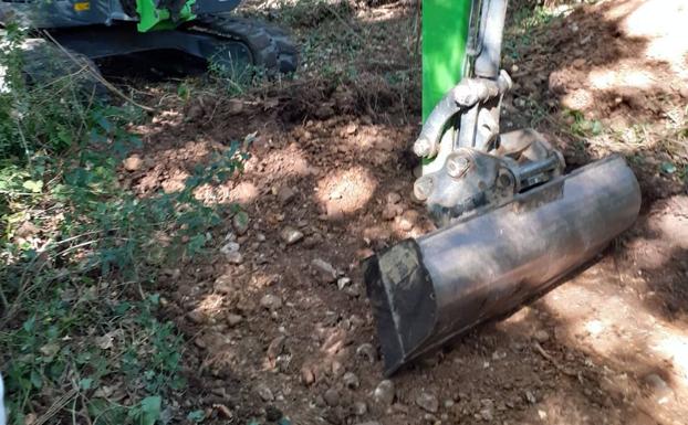 Trabajos para hallar la fosa en los terrenos de la Cartuja. 