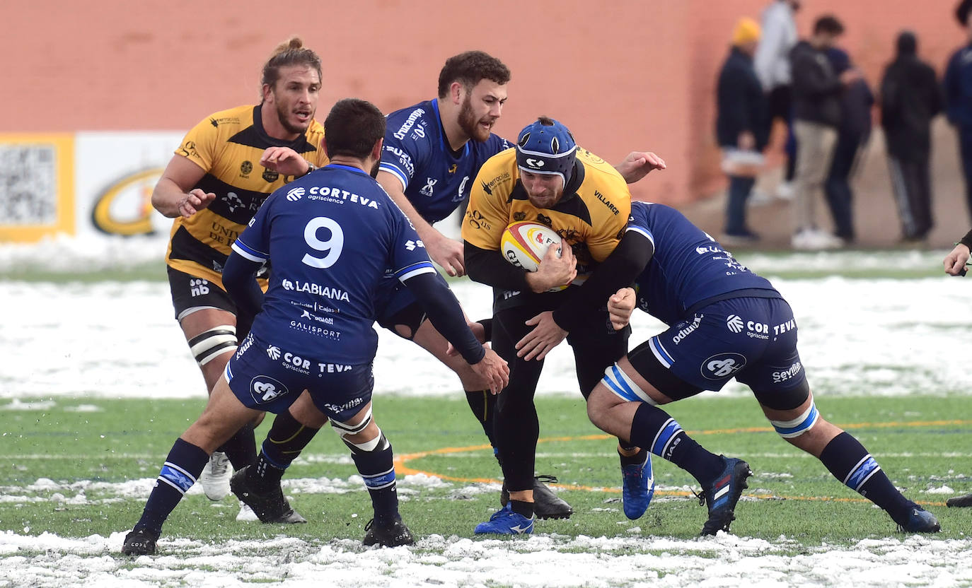 Empate entre burgaleses y sevillanos en un encuentro marcado por la nieve.