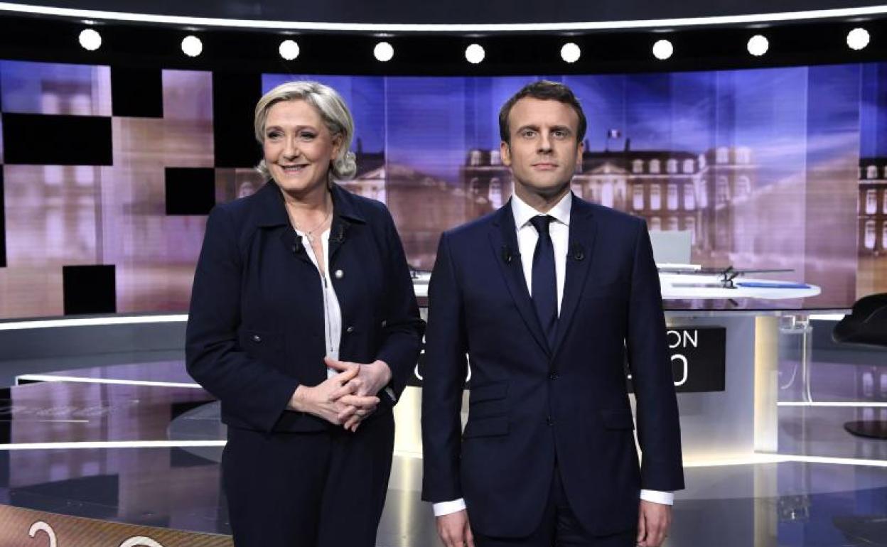 Le Pen y Macron, antes del debate. 