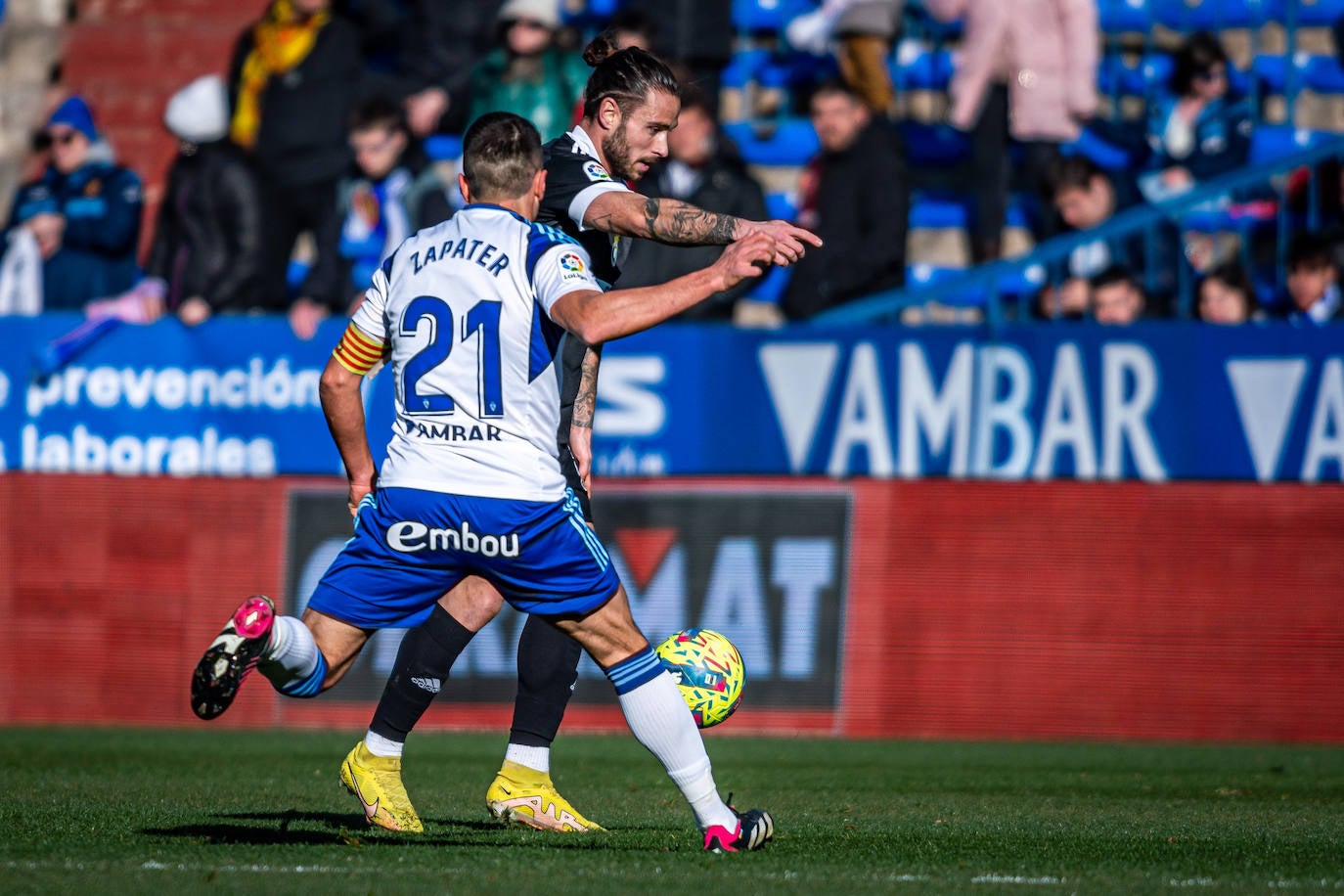 Fotos: El Burgos CF araña un punto en La Romareda