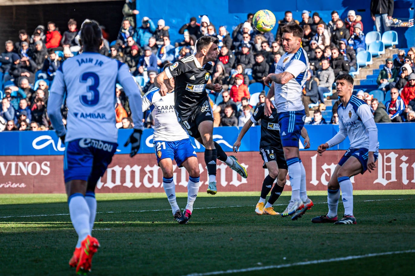 Fotos: El Burgos CF araña un punto en La Romareda