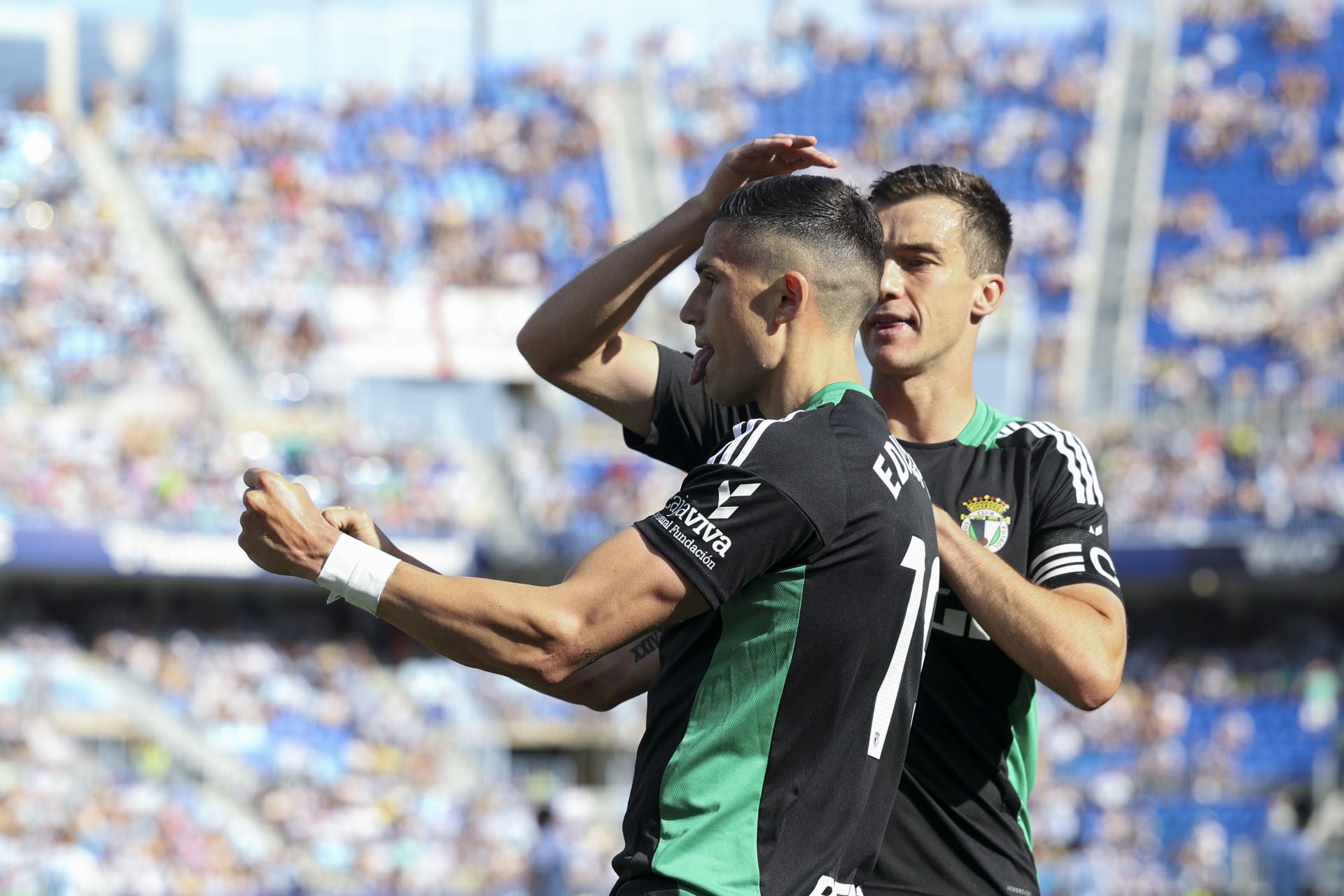 El encuentro del Málaga y del Burgos CF en La Rosaleda, en imágenes