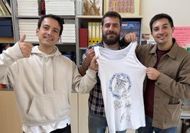Tres miembros de La M.O.D.A. en la sede de Autismo Burgos.