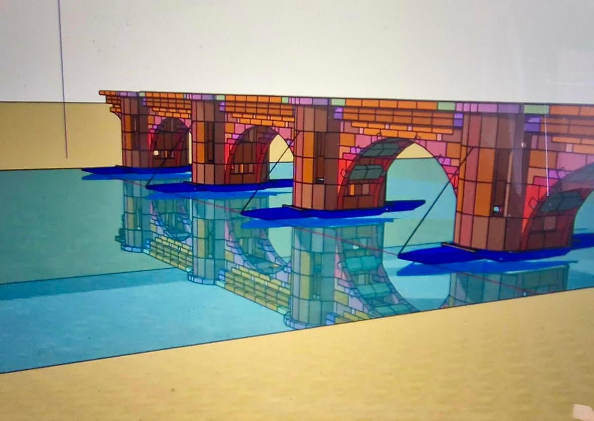 Imagen secundaria 1 - Fotografía antigua de Covarrubias con el puente original medieval y recreación del actual de cartón. 