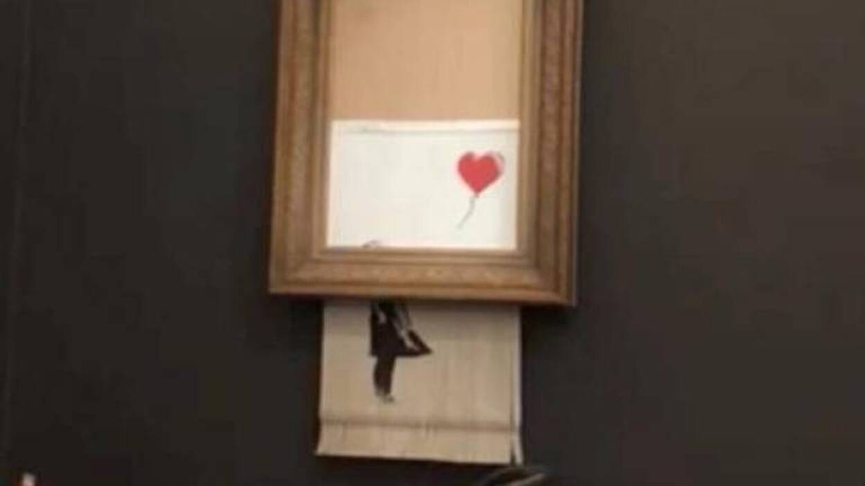 Una obra de Banksy se autodestruye tras subastarse