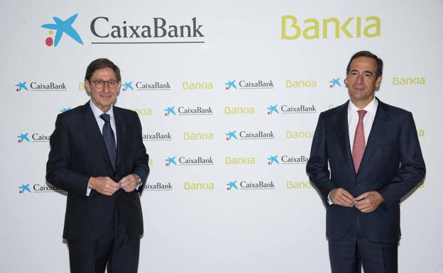 José Ignacio Goirigolzarri y Gonzálo Gortázar, hoy en la sede de CaixaBank en Valencia. 