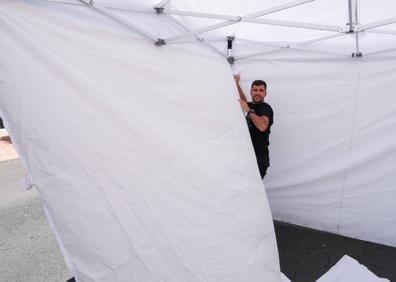 Imagen secundaria 1 - Diversos momentos de los preparativos de la feria. 