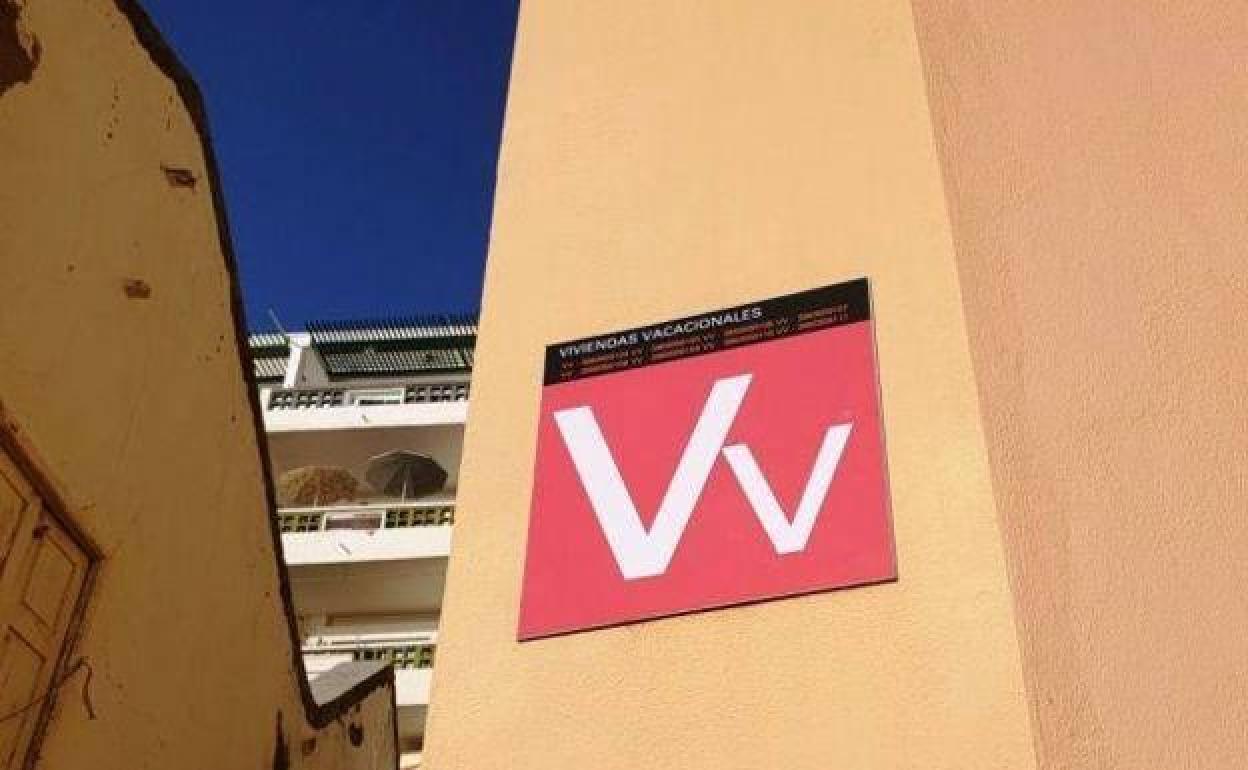 Cartel de vivienda vacacional. 