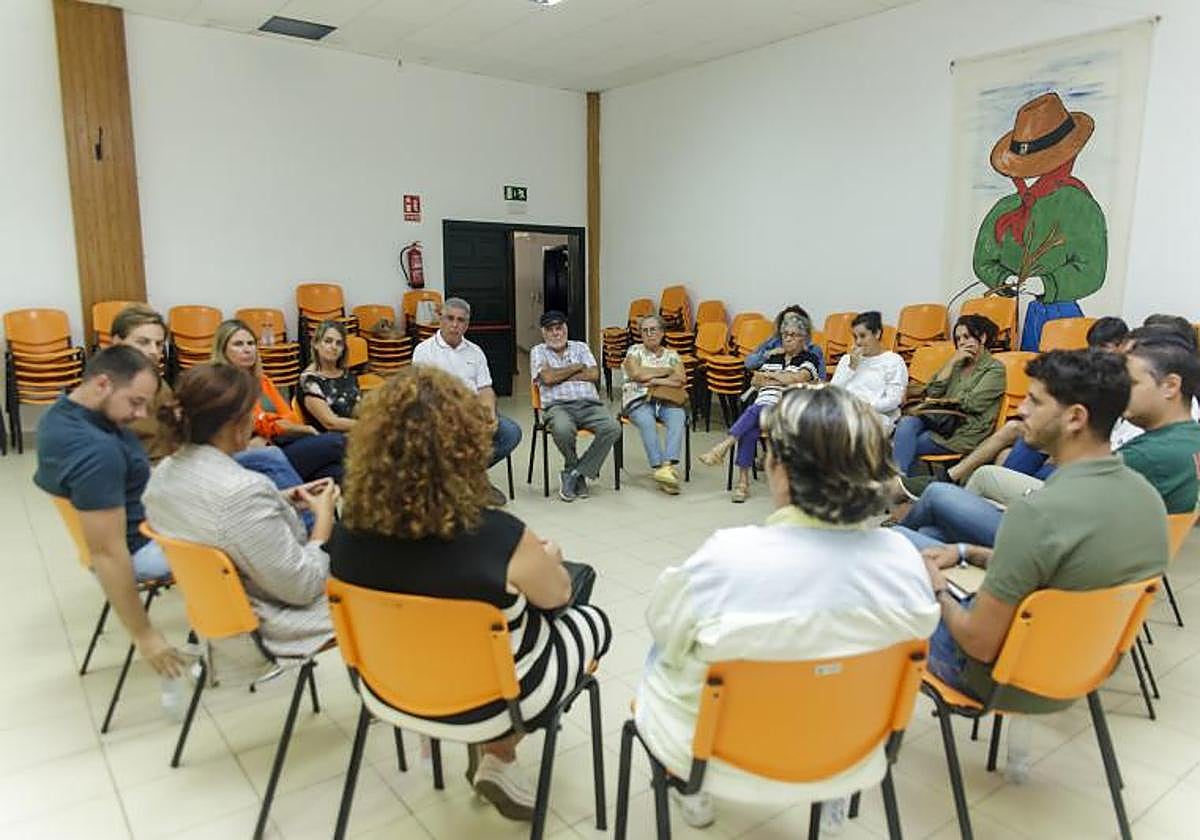 Encuentro con vecinos.