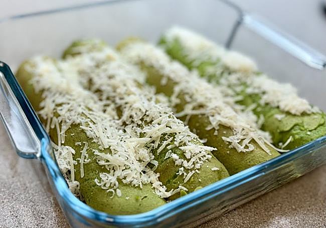 Espolvoreamos el queso y horneamos