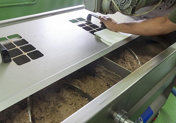 Material prensado para la producción oleosa.