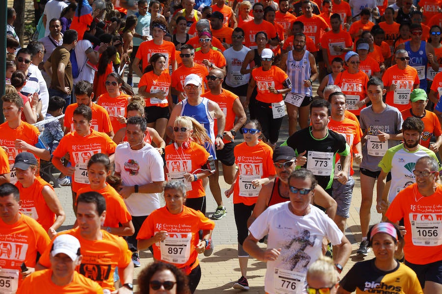 La 18 Carrera Urbana por la Integración en el Parque de Huelin, en imágenes