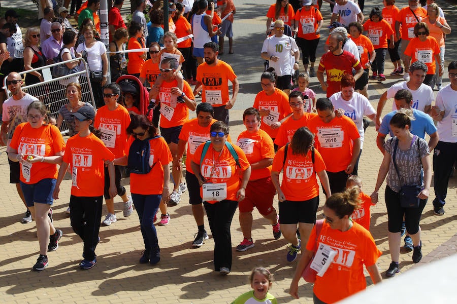 La 18 Carrera Urbana por la Integración en el Parque de Huelin, en imágenes