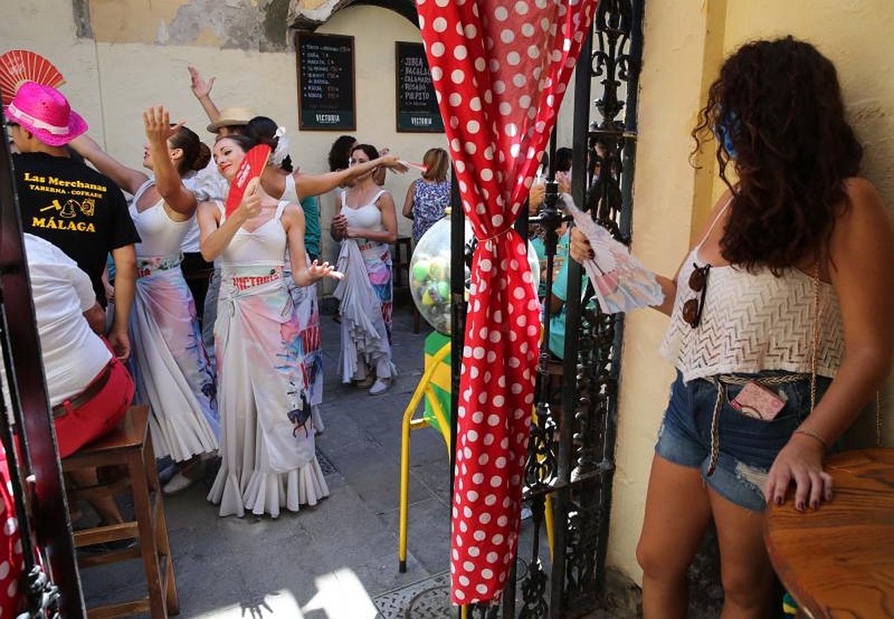 Ambiente del viernes de feria en el Centro de Málaga