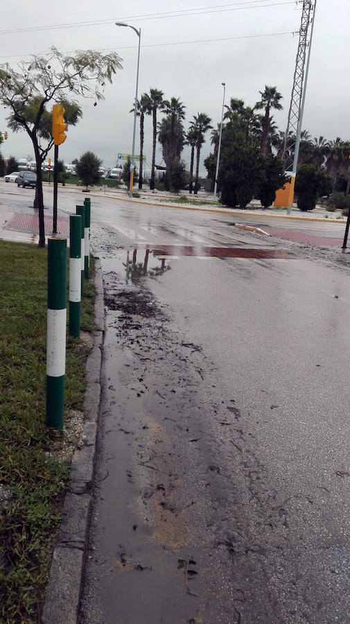 Así se ha despertado la capital malagueña tras las fuertes lluvias de este domingo