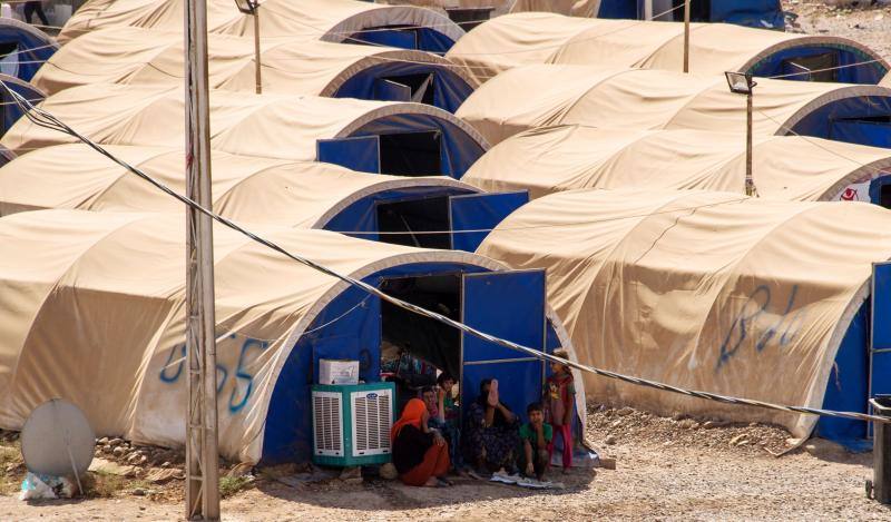 Imágenes de niños en el campamento de ACNUR preparado para los refugiados en Hammam al-Alil 