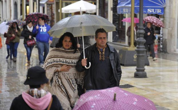 Los paraguas van a ser necesarios los próximos días en Málaga. 