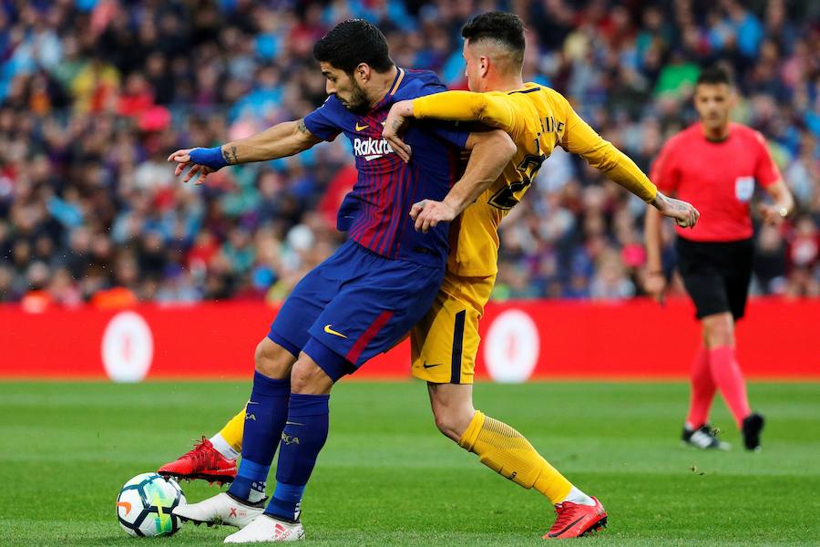 Un gran gol de Messi de falta le basta al equipo azulgrana para ganar media liga en el Camp Nou y frenar las aspiraciones del conjunto de Simeone.