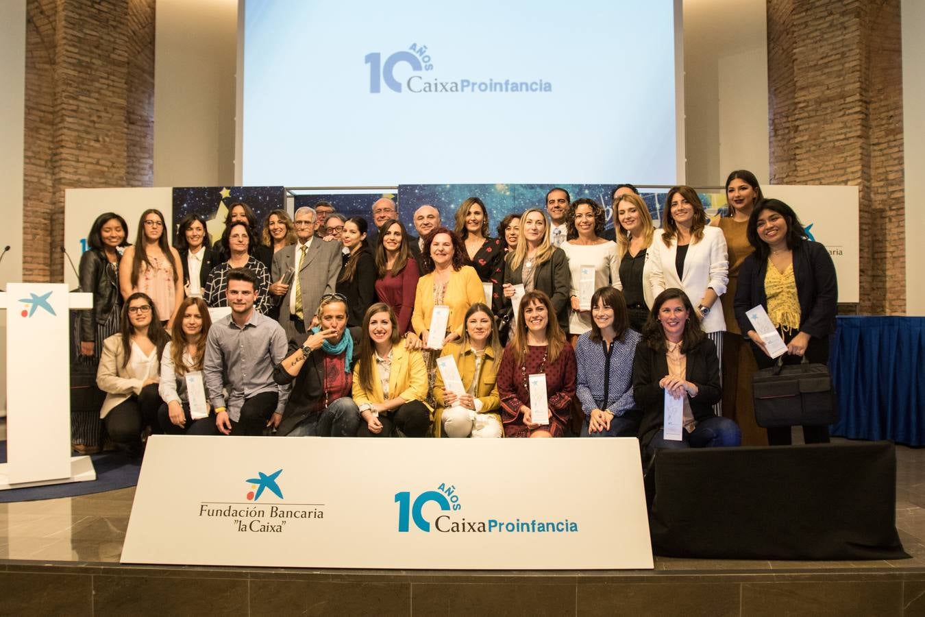 Cientos de personas abarrotan el Seminario de Málaga para celebrar el décimo aniversario de Caixa Proinfancia 