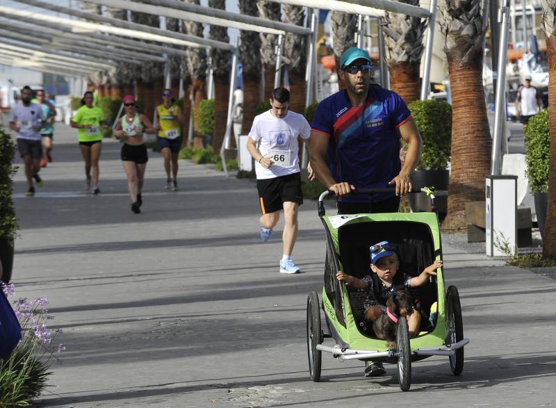 Bajo el lema 'Corre, anda, por un turno de oficio digno', más de 400 personas han participado este sábado 7 de julio en la carrera popular