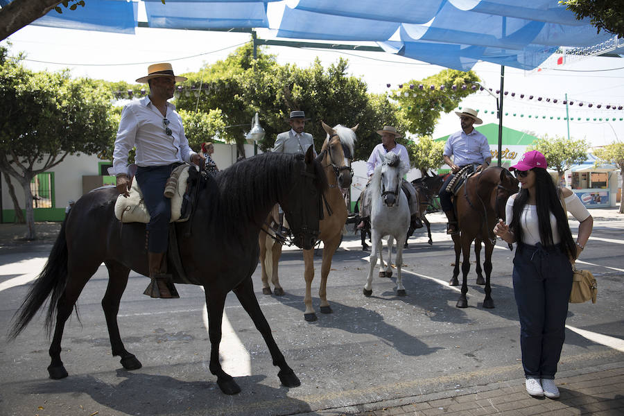 Fotos: Las mejores imágenes del primer domingo de la Feria de Málaga 2018