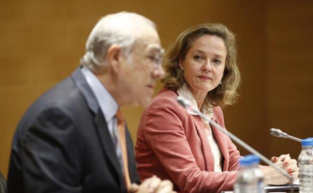 Calviño y Gurría durante la presentación del informe de la OCDE.