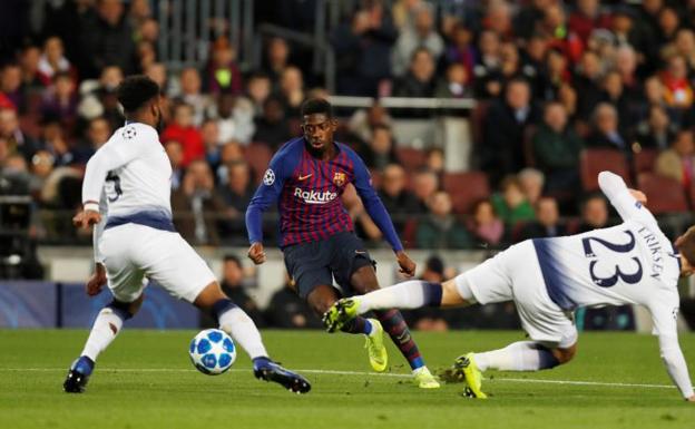 Dembélé, en acción ante Rose y Eriksen. 