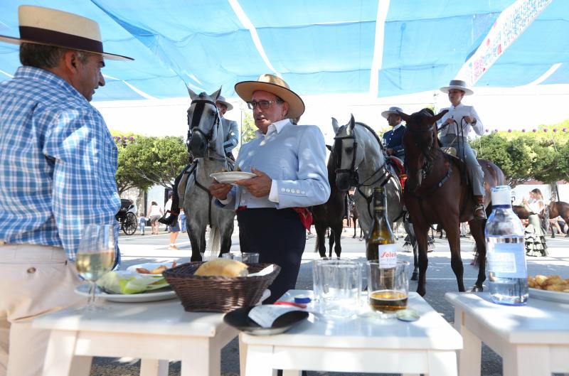Las mejores imágenes de la jornada del viernes 16 de la Feria de Málaga. Ambiente de la primera noche en el Real
