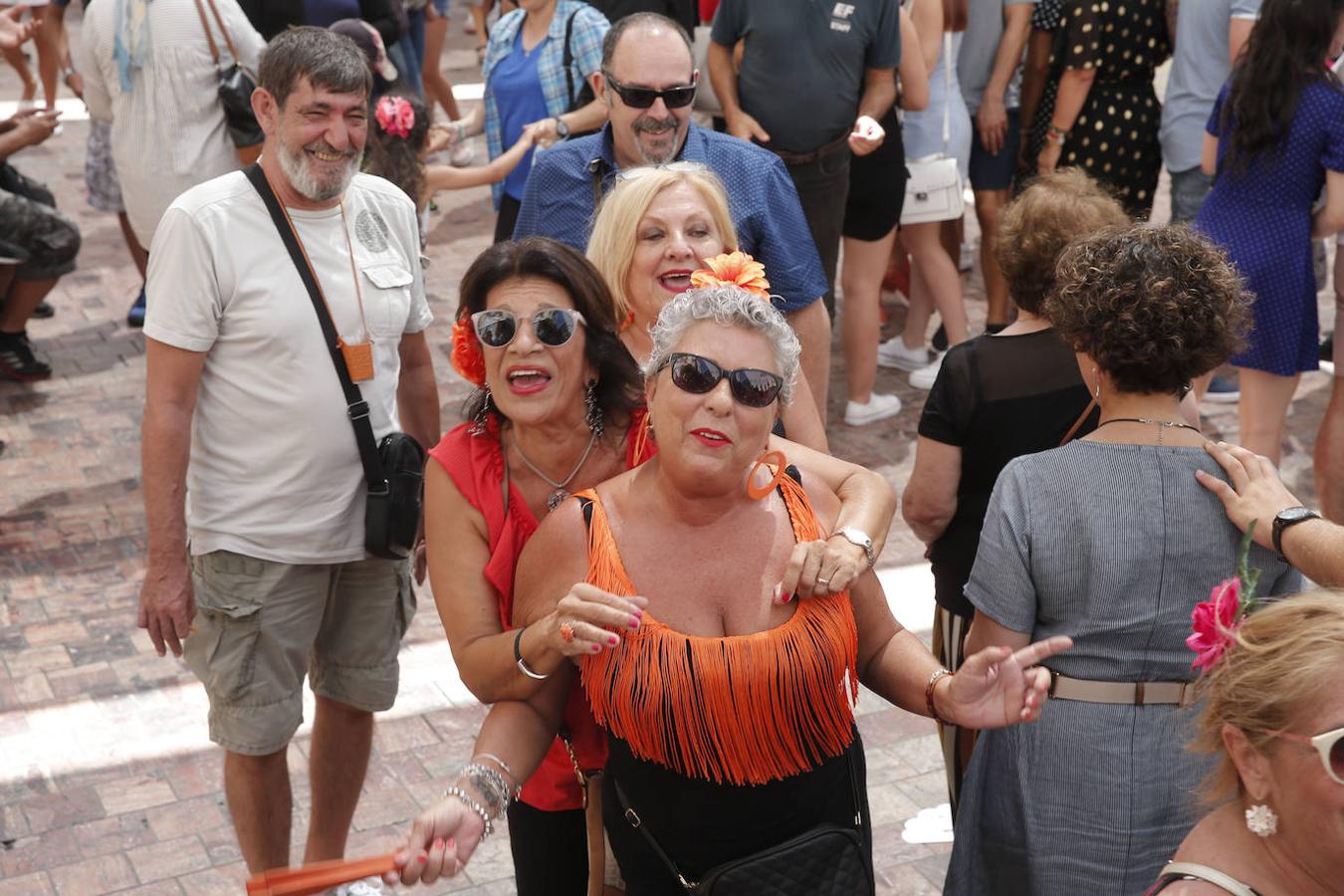 Miles de malagueños visitan el Real y el Centro en la recta final de la fiesta. 