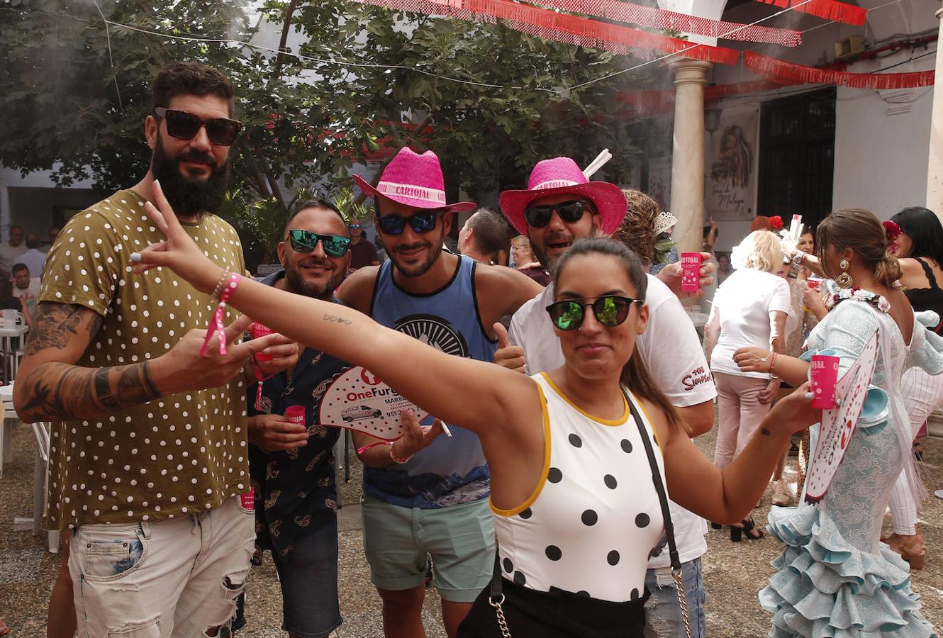 Miles de malagueños visitan el Real y el Centro en la recta final de la fiesta. 