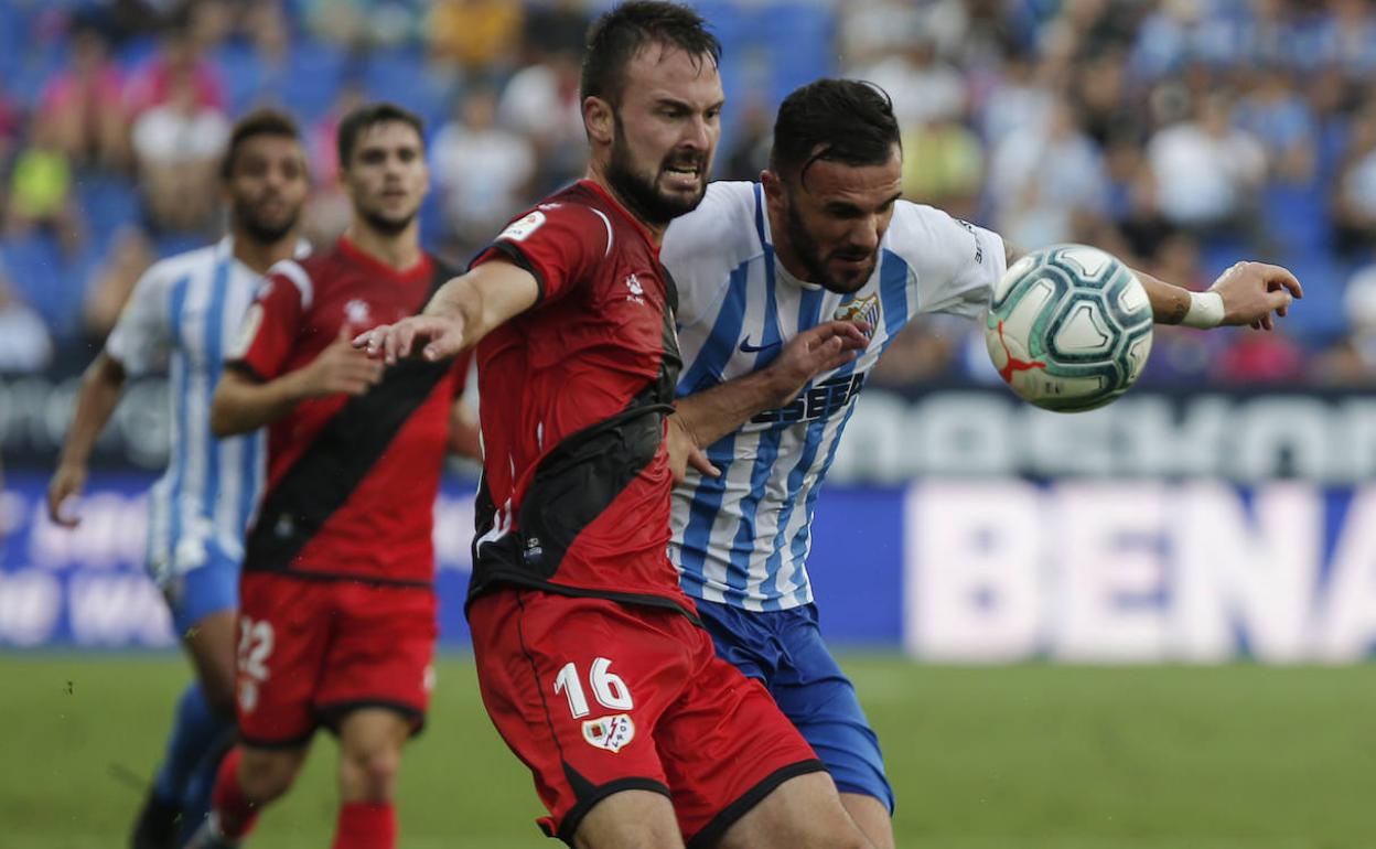 Una lucha entre Sadiku y Milic ayer. 