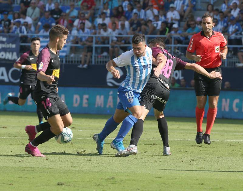 El partido en la Rosaleda entre el Málaga y el Sporting, en fotos