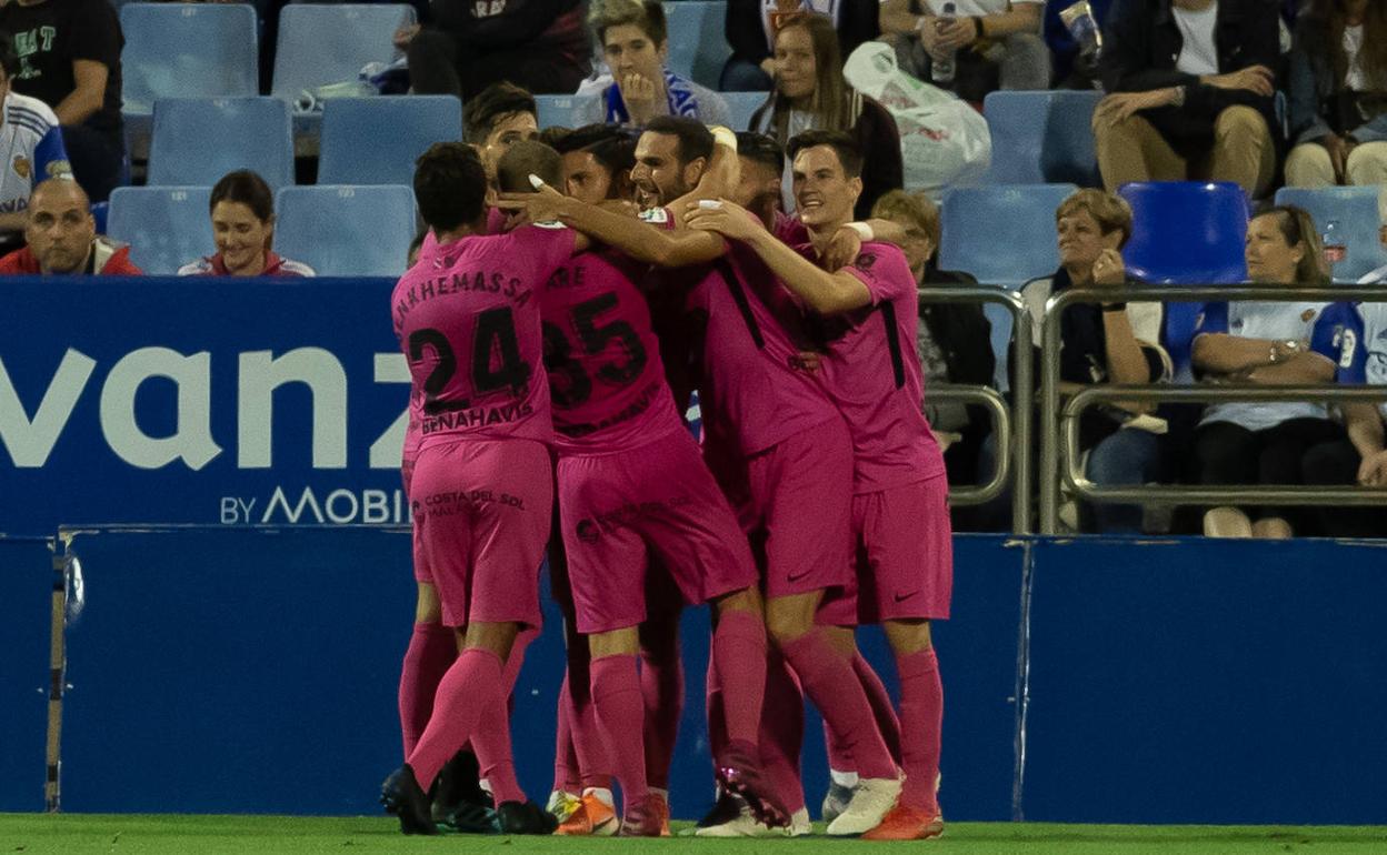 Los malaguistas celebran un gol ante el Zaragoza. 