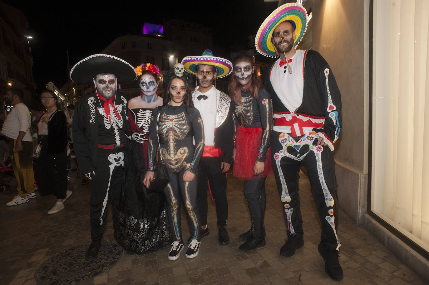 Disfraces para la Noche de Brujas en la calle Larios