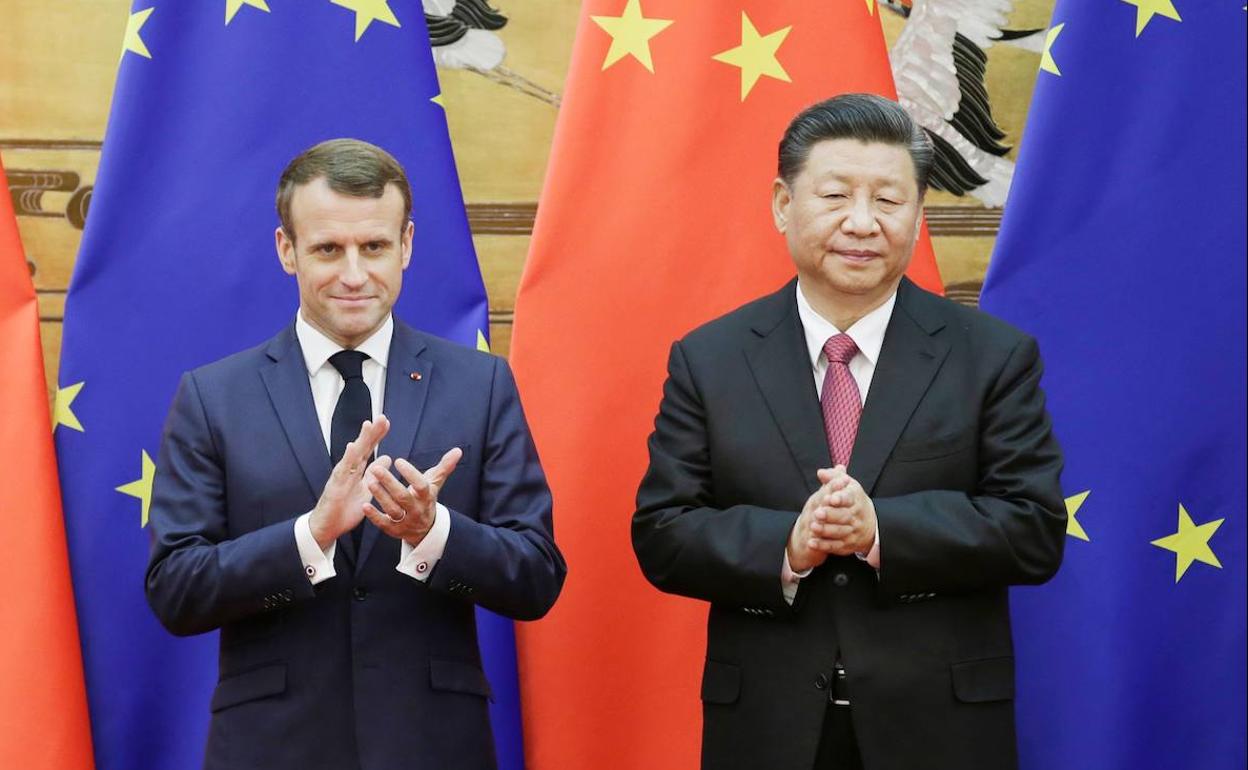 Macron y Xi, durante un acto en Peklín.