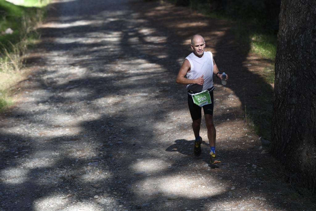 Imágenes de la 18ª edición del mítico recorrido por la sierra alhaurina donde han participado un total de 1.450 corredores 