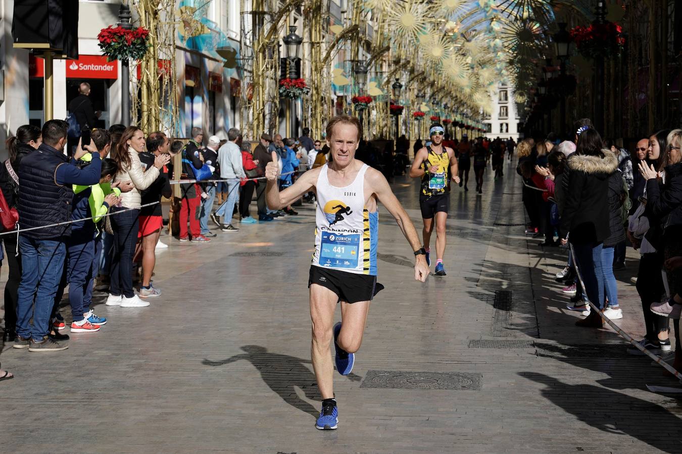 Los corredores, en calle Larios