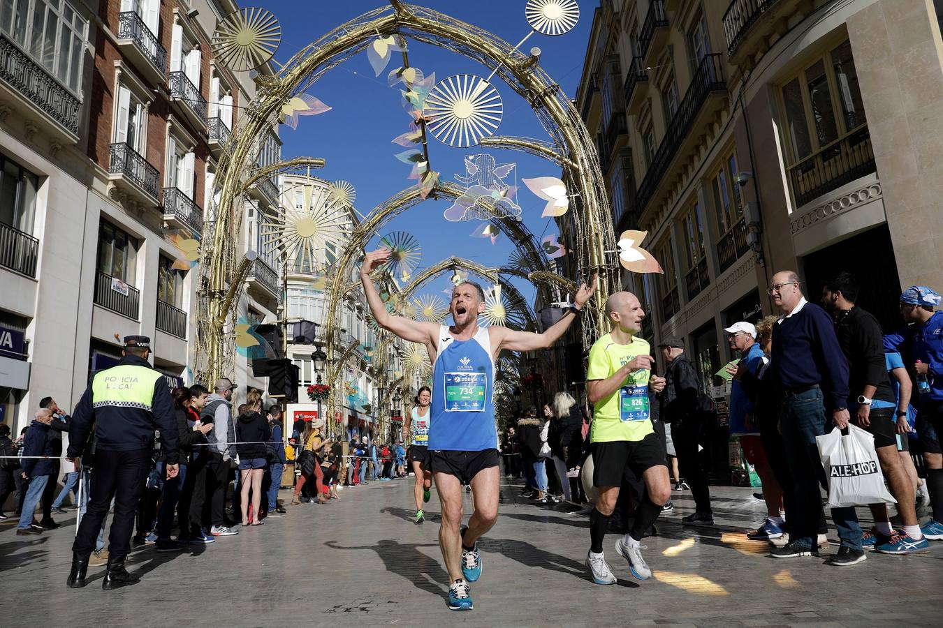 Los corredores, en calle Larios