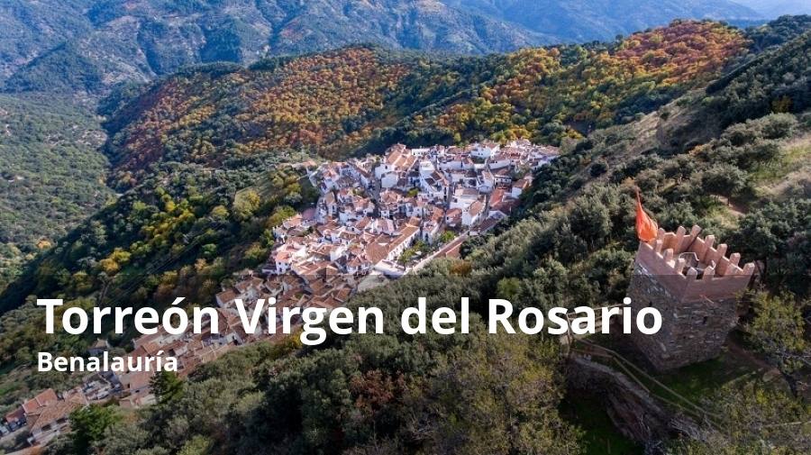 En un enclave privilegiado del Valle del Genal se erige el torreón de Benalauría, que también recibe el nombre de Virgen del Rosario -patrona de la localidad-. Con este enclave, al que se puede acceder a pie por un sendero ascendente desde el propio casco urbano, se rinde homenaje al indudable pasado bereber de Benalauría. La torre fue construida a imagen y semejanza de las atalayas que antaño servían de vigilancia y de comunicación en este abrupto territorio de la Serranía de Ronda.