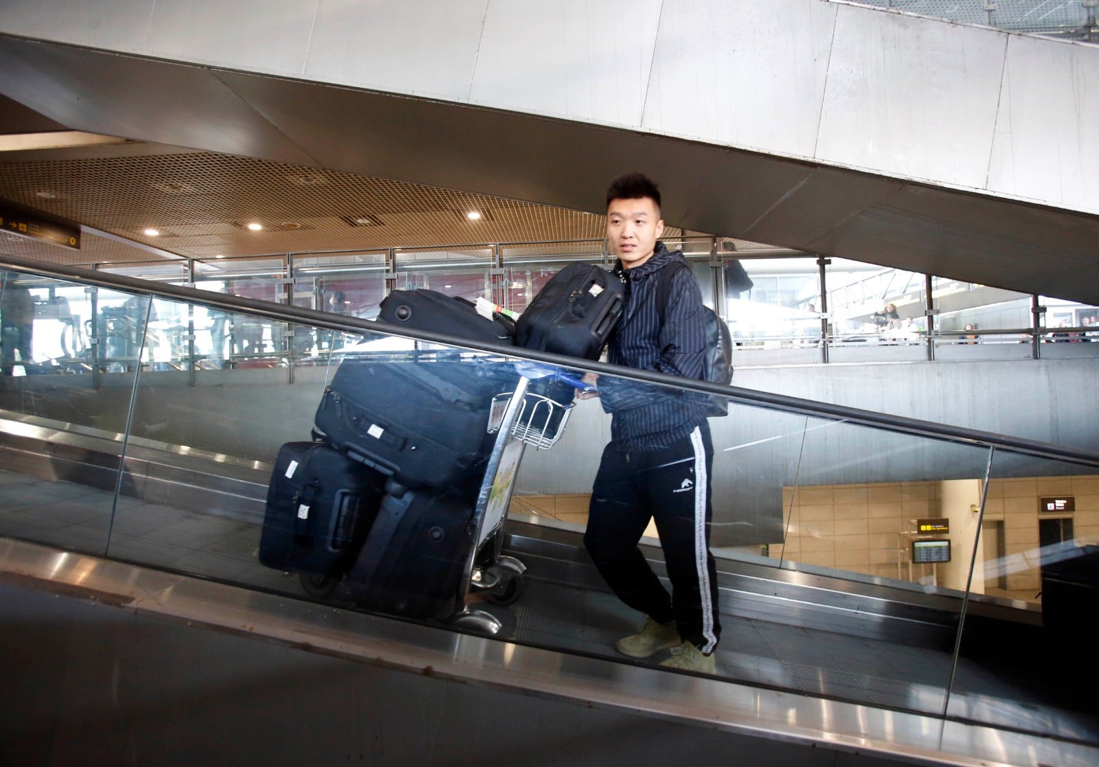 La llegada a Málaga del equipo chino de Wuhan, en imágenes.