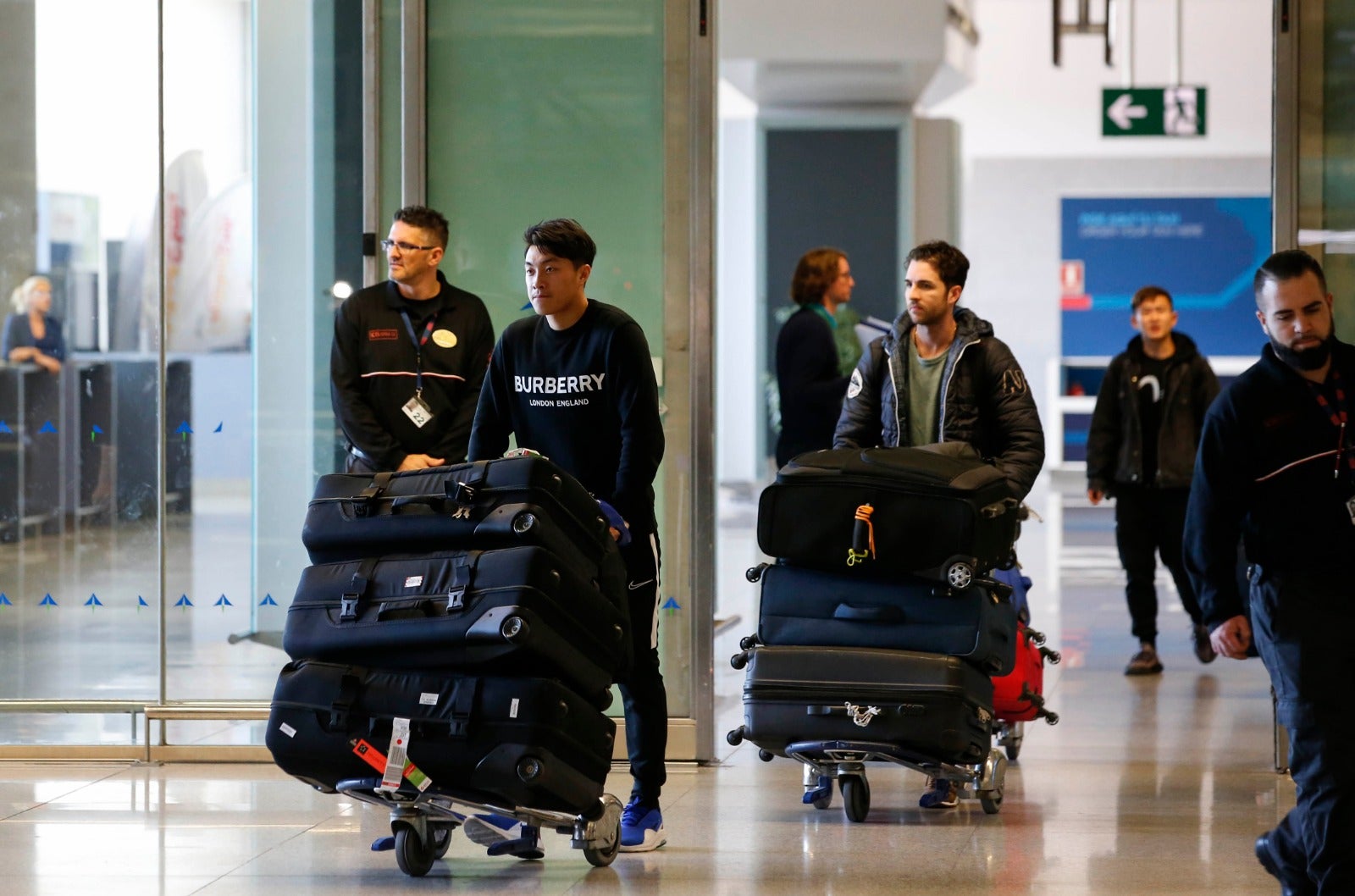 La llegada a Málaga del equipo chino de Wuhan, en imágenes.