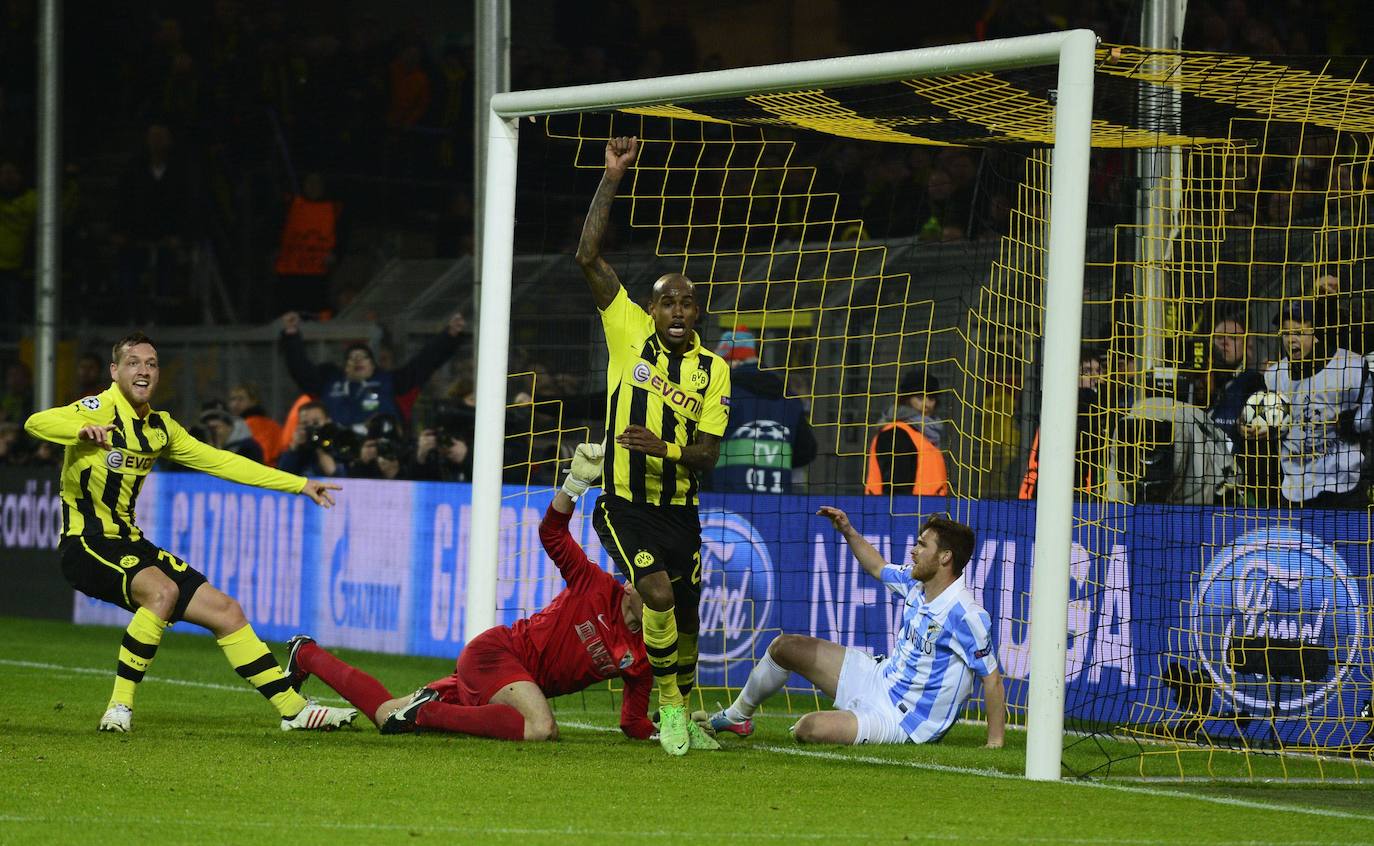 La injusta eliminación del Málaga en la Champions en el campo del Dortmund cumple hoy siete años con las mismas dudas que el primer día. Revive aquel momento foto a foto.