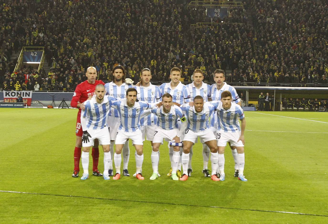 La injusta eliminación del Málaga en la Champions en el campo del Dortmund cumple hoy siete años con las mismas dudas que el primer día. Revive aquel momento foto a foto.