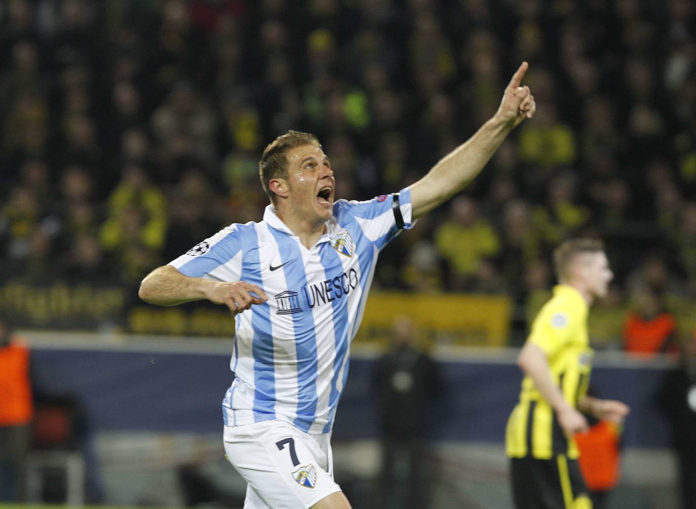 La injusta eliminación del Málaga en la Champions en el campo del Dortmund cumple hoy siete años con las mismas dudas que el primer día. Revive aquel momento foto a foto.