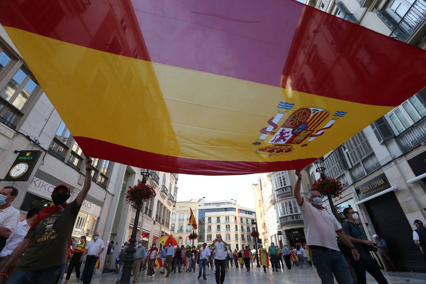 Decenas de personas llenaron calle Larios en la protesta 