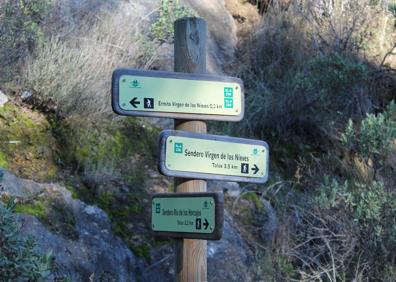 Imagen secundaria 1 - Arriba, indicativos de esta ruta. Abajo, cruce de caminos con el sendero del río de los Horcajos, y, a la derecha, área recreativa junto a la ermita.