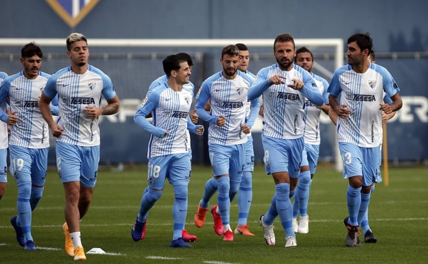 Jozabed, Mejías, Matos, Cristian, Rahmani, Orlando Sá, Benkhemassa y Escassi, en un entreno. 